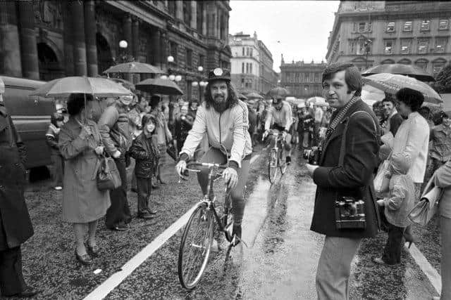 Scottish entertainer Billy Connolly leaves Glasgow on a sponsored cycle ride to Inverness in August 1980. Billy sets off from a rain-soaked George Square