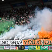 The Celtic support housed in the Roseburn Stand unfurled this banner on pyro ahead of the match against Hearts, followed by a number of flares.