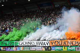 The Celtic support housed in the Roseburn Stand unfurled this banner on pyro ahead of the match against Hearts, followed by a number of flares.