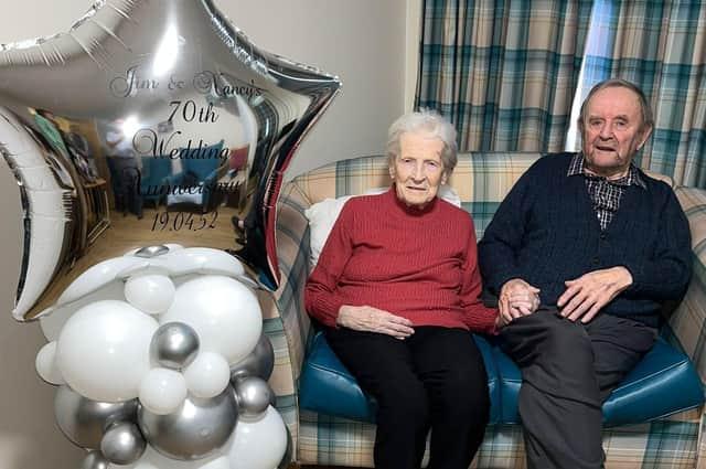 Jim and Nancy Cruickshank toast their platinum wedding.