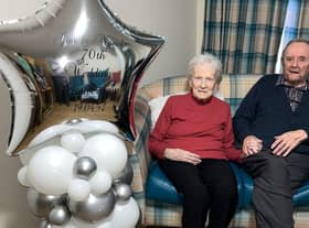 Jim and Nancy Cruickshank toast their platinum wedding.