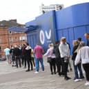 Rangers fans queue up outside the club shop at Ibrox after the release of the home strip last month. Picture: SNS