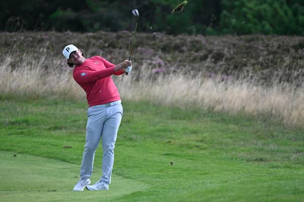 Ewen Ferguson of Scotland plays his shot during day four of the Sydbank Esbjerg Challenge at Esbjerg Golfklub (Photo by Oliver Hardt/Getty Images)