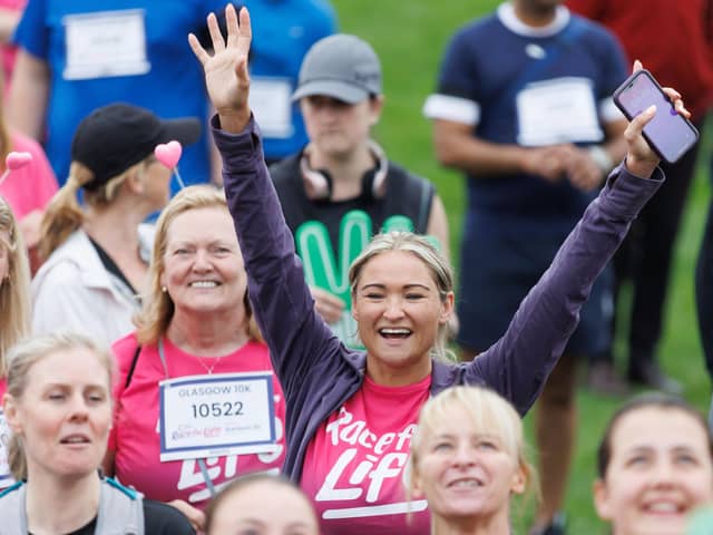 Feeling on top of the world at the Glasgow Race for Life. PIC: Steve Welsh.