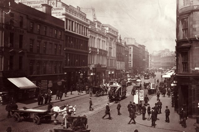 Passers-by and horse-drawn traffic in Jamaica Street.