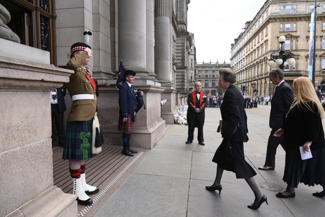 The Princess Royal and Vice Admiral Sir Tim Laurence arrive.