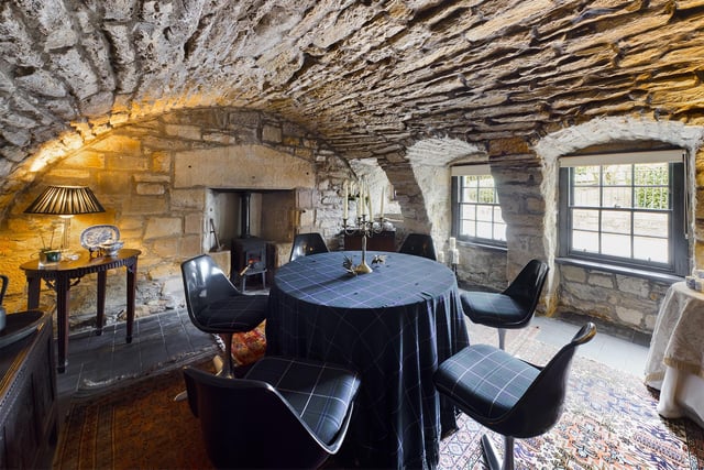 A stunning dining space, the room's former use as the courthouse jail is sure to inspire many dinner party stories.