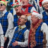 The choir get into full Christmas voice