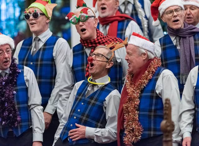The choir get into full Christmas voice