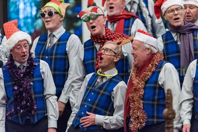 The choir get into full Christmas voice