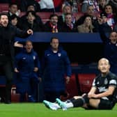 Atletico Madrid manager Diego Simeone reacts to a red card tackle from Celtic's Daizen Maeda.
