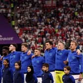 AL KHOR, QATAR - NOVEMBER 25: England stands for their national anthem before the match against the United States during the FIFA World Cup Qatar 2022 Group B match between England and USA at Al Bayt Stadium on November 25, 2022 in Al Khor, Qatar. (Photo by Elsa/Getty Images)