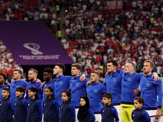 AL KHOR, QATAR - NOVEMBER 25: England stands for their national anthem before the match against the United States during the FIFA World Cup Qatar 2022 Group B match between England and USA at Al Bayt Stadium on November 25, 2022 in Al Khor, Qatar. (Photo by Elsa/Getty Images)