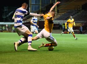 Jake Hastie goes down in box under Sean McGinty challenge