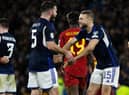 Ryan Porteous celebrates with Grant Hanley after Scotland defeat Spain 2-0 at Hampden Park. Picture: SNS