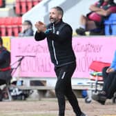 Motherwell gaffer Stephen Robinson and his assistant Keith Lasley