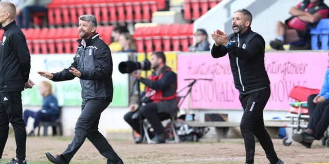 Motherwell gaffer Stephen Robinson and his assistant Keith Lasley