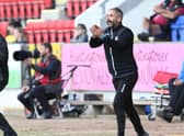 Motherwell gaffer Stephen Robinson and his assistant Keith Lasley