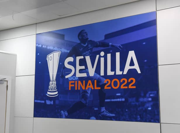 <p>Glasgow Airport displays Sevilla 2022 posters as Rangers fans leave to go to the Europa League final in Seville. (Photo by Craig Foy / SNS Group)</p>