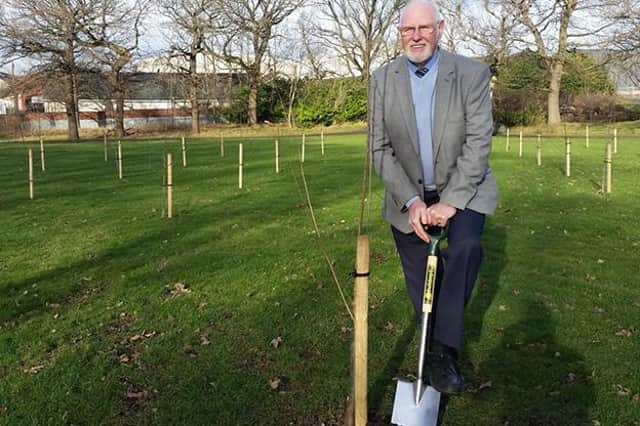 Some 800 trees have already been planted in 13 locations across South Lanarkshire, this one by Councillor John Ross.