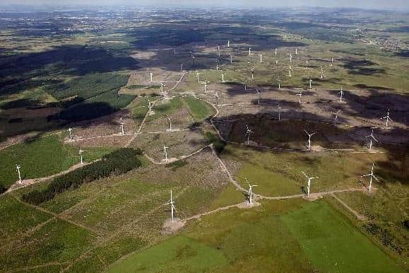 An aerial shot of ScottishPower's Black Law Wind Farm near Climpy.