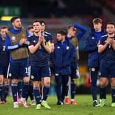 Andy Robertson of Scotland applauds the fans with team-mates following defeat to Croatia on Tuesday night (Pic by Stu Forster/Getty Images)