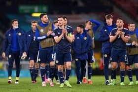 Andy Robertson of Scotland applauds the fans with team-mates following defeat to Croatia on Tuesday night (Pic by Stu Forster/Getty Images)