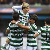 Celtic striker Kyogo Furuhashi celebrates scoring his second in the rout of Dundee United. (Photo by Rob Casey / SNS Group)