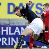 Nicky Devlin in action for Ayr United against Falkirk (pic: Michael Gillen)