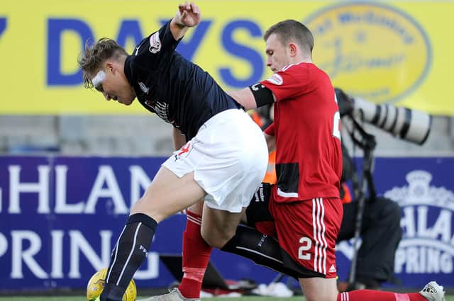 Nicky Devlin in action for Ayr United against Falkirk (pic: Michael Gillen)