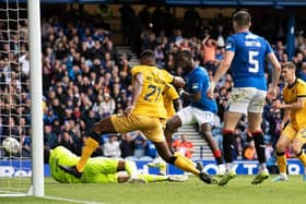 Abdallah Sima scores from close range to make it 3-0 for Rangers against Livingston.