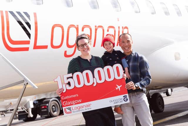 Laura, Stan and Iver Lee were Loganair's 1.5 millionth passengers at Glasgow Airport