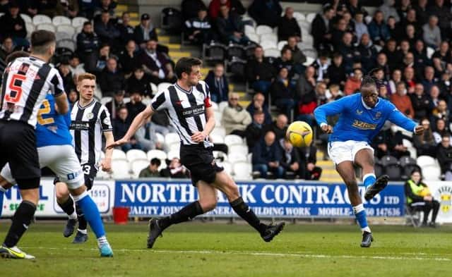 Joe Aribo curls a shot around St Mirren captain Joe Shaughnessy to make it 4-0 for Rangers in their Premiership fixture in Paisley. (Photo by Craig Williamson / SNS Group)