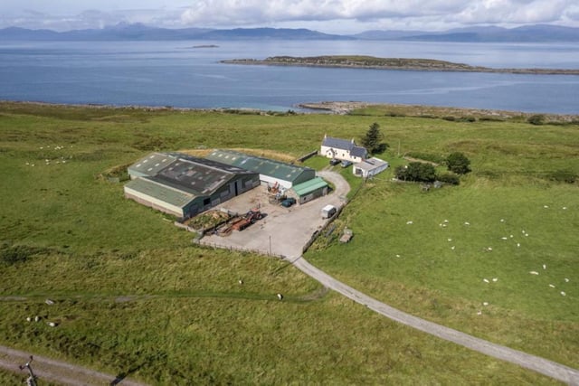 The farmhouse and farm buildings.