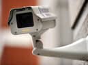 A generic picture of a CCTV camera on the side of a building