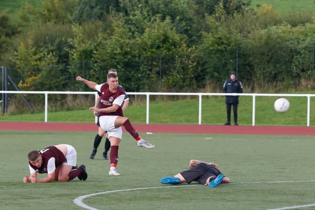 Marc Smith scores Carluke's fourth goal in the win over Glasgow United (Pic by Kevin Ramage)