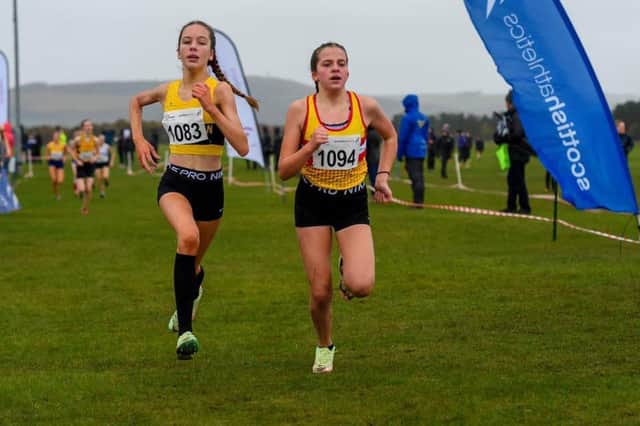 Jessica Inglis (right) was the first Law and District AAC athlete home at Lanark (Pic by Bobby Gavin)