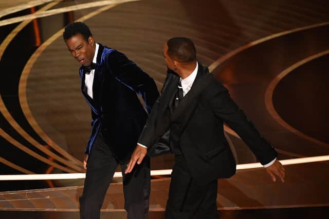 Actor Will Smith appears to slap actor Chris Rock onstage during the 94th Oscars at the Dolby Theatre in Hollywood. Photo by ROBYN BECK/AFP via Getty Images