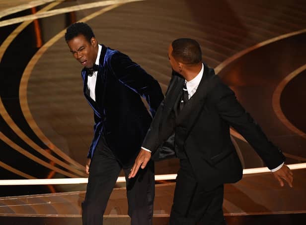 <p>Actor Will Smith appears to slap actor Chris Rock onstage during the 94th Oscars. </p>