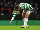 Celtic's Jota pulls up with a hamstring injury during the club's win over Hearts, during which Anthony Ralston and Stephen Welsh were also lost to hamstring and ankle issues, respectively. And Ange Postecoglou fears more losses over the December glut of games. (Photo by Craig Foy / SNS Group)