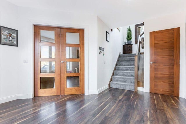 The welcoming entrance hall and stairwell gives a true flavour of the exceptional finish throughout.