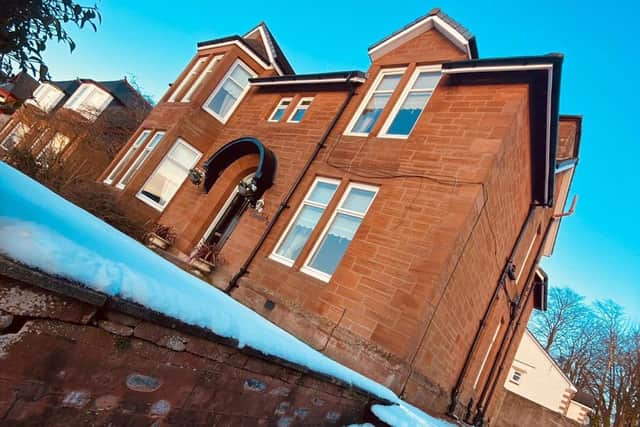 This imposing red sandstone property sits in an elevated corner plot, built in 1917 by Lord Belhaven.