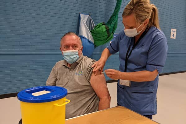 John Gordon receives his second jab from nurse Paula McMahon