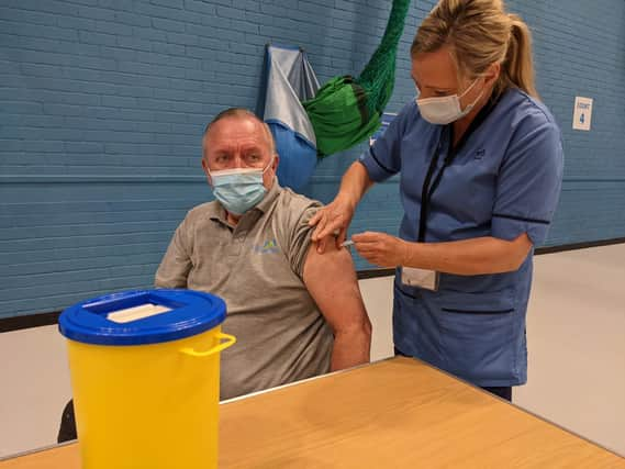 John Gordon receives his second jab from nurse Paula McMahon