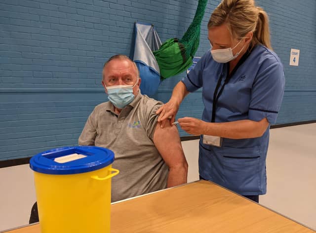 John Gordon receives his second jab from nurse Paula McMahon