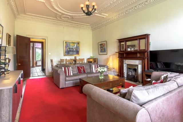 This large drawing room has a beautiful bay window.