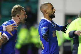 Kemar Roofe (right) celebrates with Scott Arfield after scoring the late winner for Rangers against Hibs at Easter Road. (Photo by Craig Williamson / SNS Group)