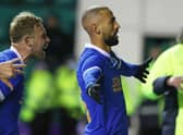 Kemar Roofe (right) celebrates with Scott Arfield after scoring the late winner for Rangers against Hibs at Easter Road. (Photo by Craig Williamson / SNS Group)