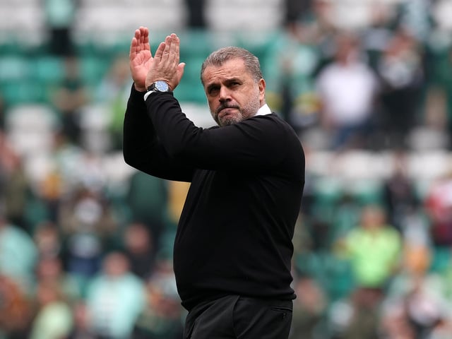 Postecoglou applauds Celtic fans after the final whistle.