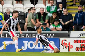 Keanu Baccus celebrates in front of the Hibs support after opening the scoring for St Mirren. Picture: SNS